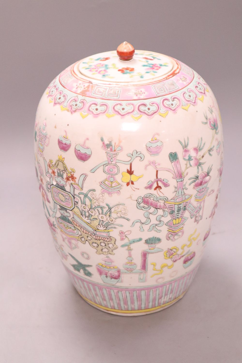 A Chinese famille rose Hundred Antiques jar and cover